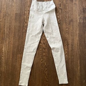 NWOT NUX white animal legging size small.